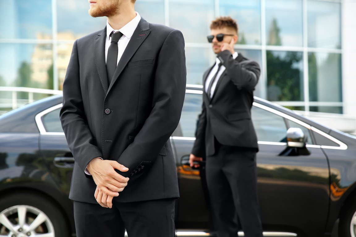 Professional Bodyguards near Car Outdoors